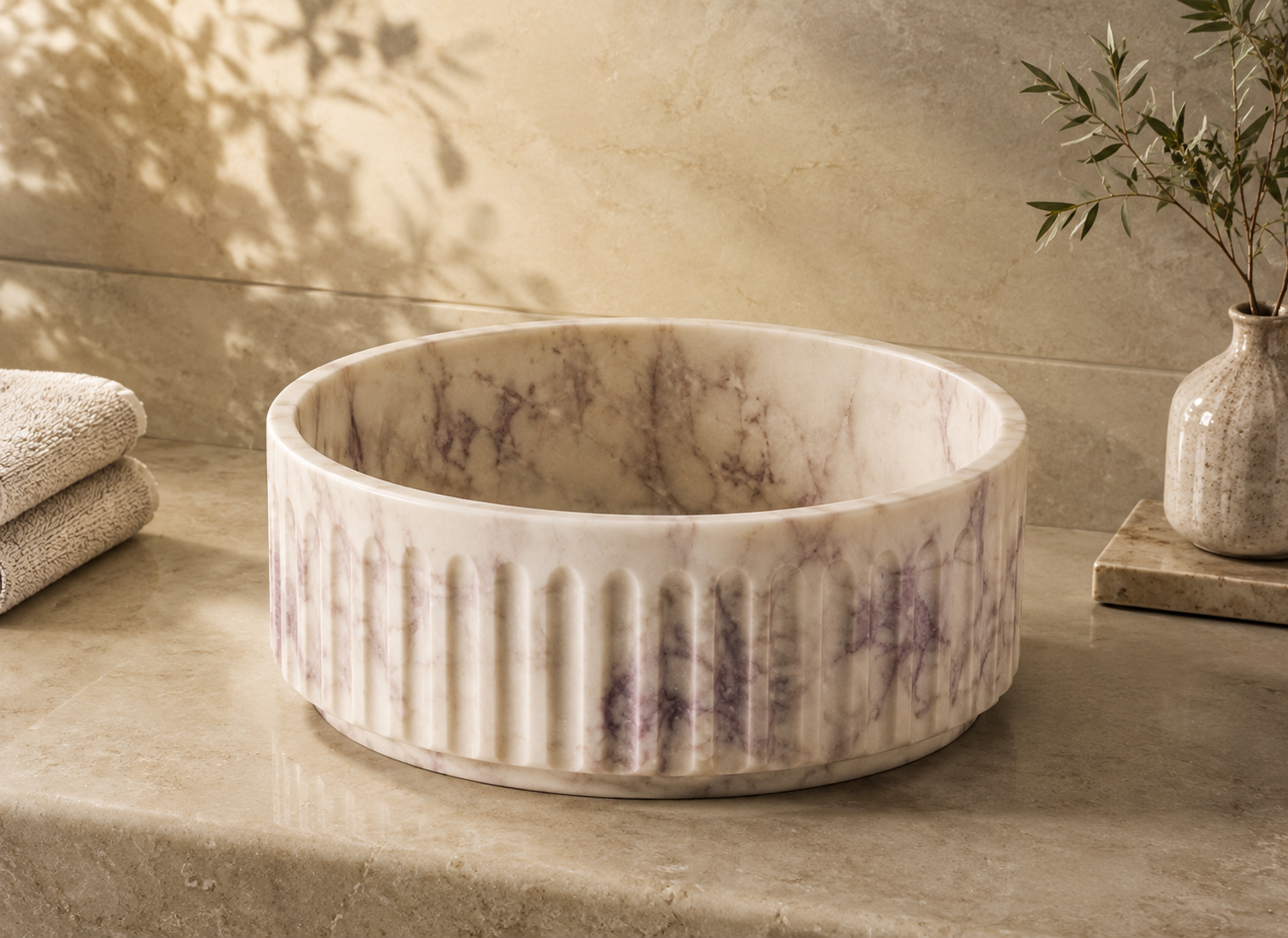 Luxury Italian stone wash basin with premium craftsmanship, natural stone textures, and elegant design for modern bathrooms by CAROLIETO.